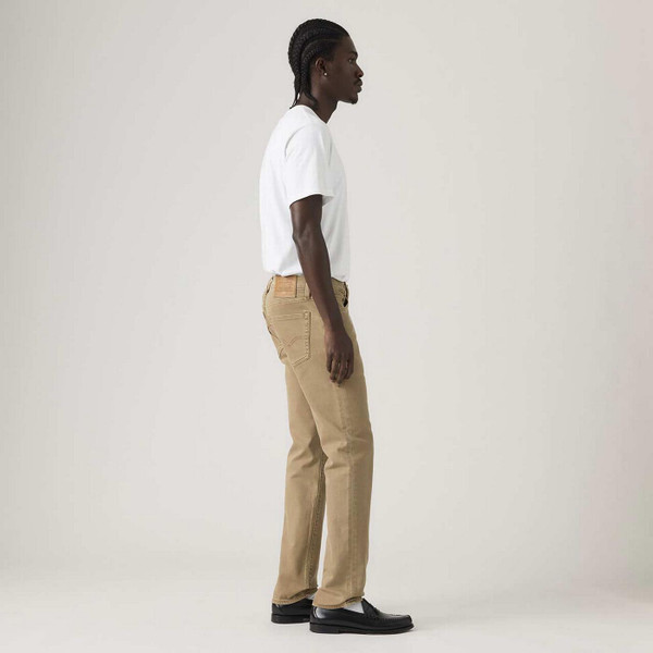 Model Wearing Levi's 511 Slim Retro Denim Jeans in English Toffee - Side View