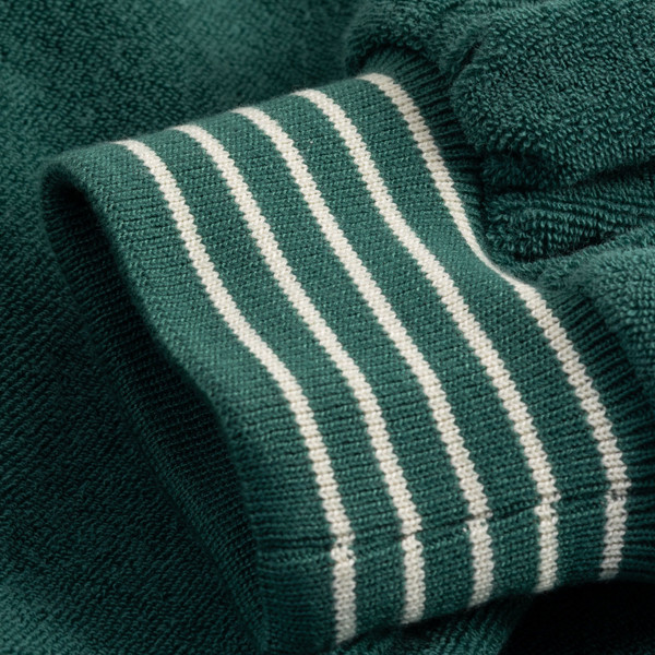 Tipped striped cuffs on Mademoiselle Yeye Rally Retro 70s Varsity College Towelling Jacket in Green