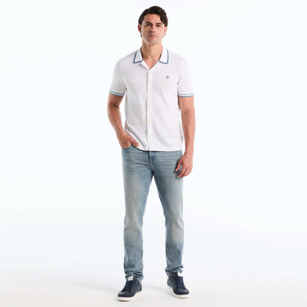 Model Wearing the Original Penguin Men's Retro Seed Stripe Knitted Resort Collar Shirt in Bright White - Front View