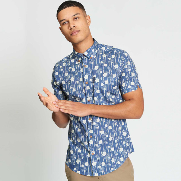 Model Wearing Ben Sherman Men's Retro Short Sleeve Floral Bamboo Print Shirt in Indigo