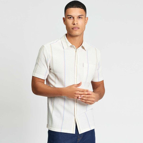 Model Wearing the Ben Sherman Seersucker Stripe Mod Short Sleeve Shirt in Ivory