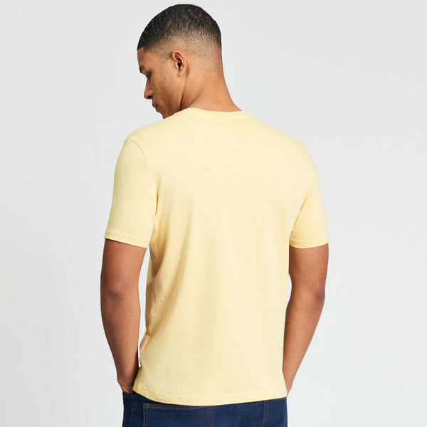 Man Wearing Ben Sherman Men's Retro Signature Logo Crew Neck T-shirt in Butterscotch - Back View