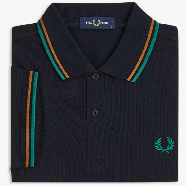Fred Perry M3600 Mod Twin Tipped Polo Shirt in Navy/Dark Caramel - Shirt Folded Image 