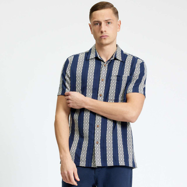 Model wearing Ben Sherman Men's Retro Block Geo Jacquard Stripe Short Sleeve  Shirt in Twilight Denim - Front View