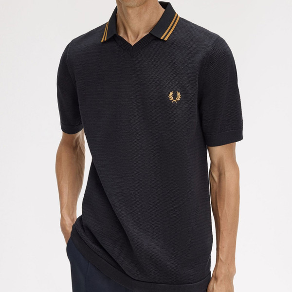 Man wearing Fred Perry Pointelle Knit Trophy Neck Tipped Polo Shirt in Black