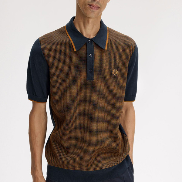 Man wearing Fred Perry Tonic Waffle Knitted Polo Shirt in Navy