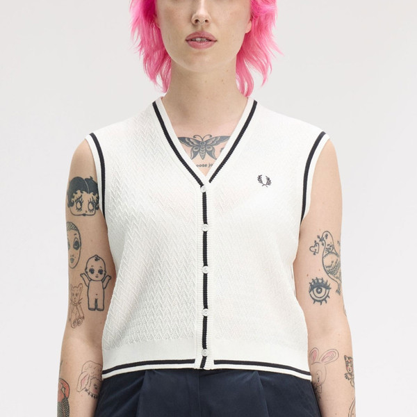 Woman wearing Fred Perry Button Through Diamond Textured Knit Tipped Tank Top in Snow White