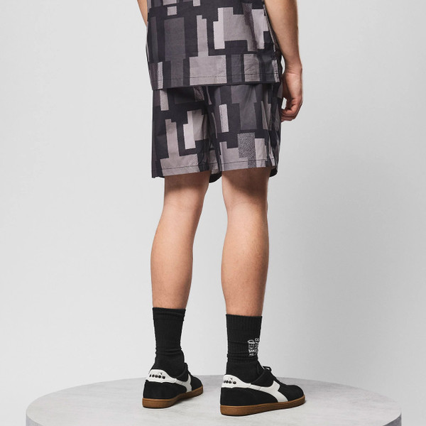Weekend Offender Ouzou Terrain Block Print Summer Shorts in Black - Back Image Model