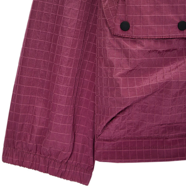 Sleeve and pocket detail on Weekend Offender Grohl Overhead Men's Ripstop Hooded Jacket in Kirsch