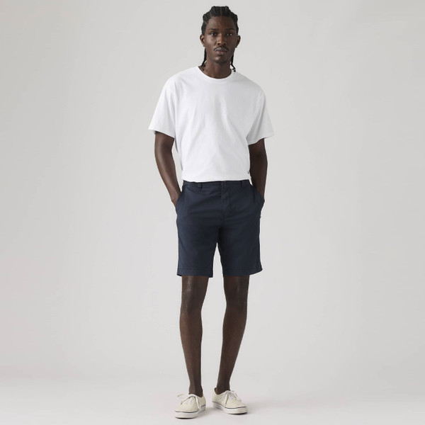 Man wearing Levi's Men's Retro XX Chino Shorts in Baltic Navy