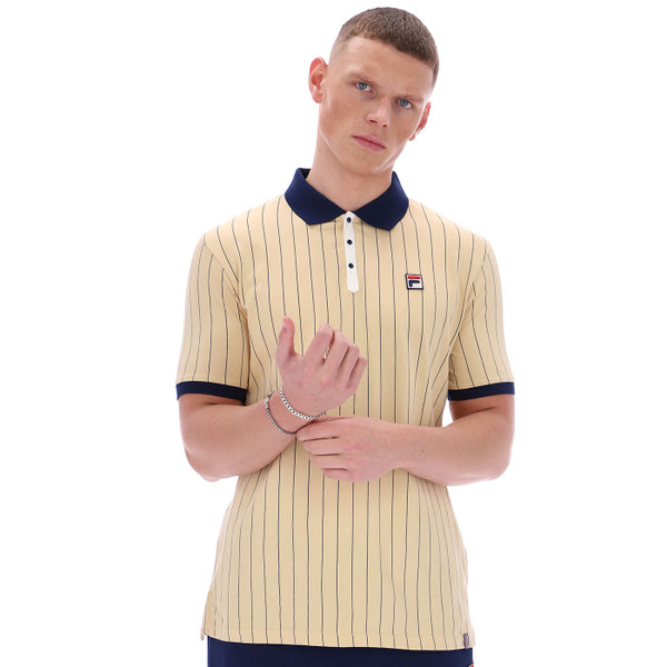 Man wearing Fila Vintage Mens BB1 Classic Pinstripe Jersey Polo T-shirt in Beige