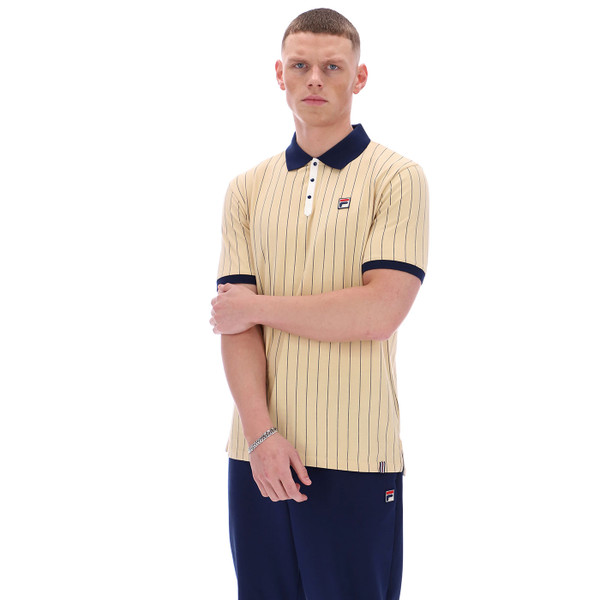 Man wearing Fila Vintage Mens BB1 Classic Pinstripe Jersey Polo T-shirt in Beige