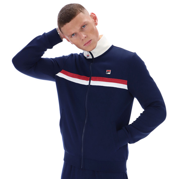 Man wearing Fila Vintage Enrico Retro Terry Stripe Track Jacket in Navy