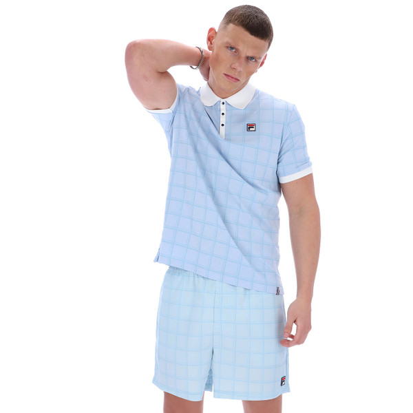 Man wearing Fila Vintage Ignazio Tennis Tonal Check Polo Shirt in Skyway Blue with matching shorts