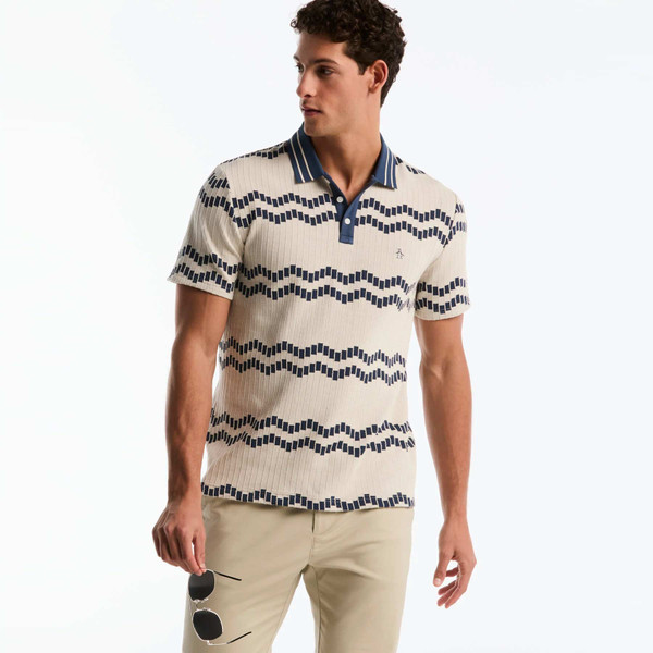Model Wearing Original Penguin Jacquard Wavy Tiles Polo Shirt in Birch - Front Facing holding Sunglasses
