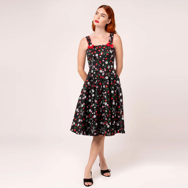 Woman wearing Hell Bunny Isobel Strawberry Retro Summer Dress in Black