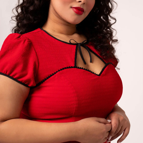 Sleeve bow and fabric detail on Hell Bunny Casey 50s Vintage Bolero Dress in Red
