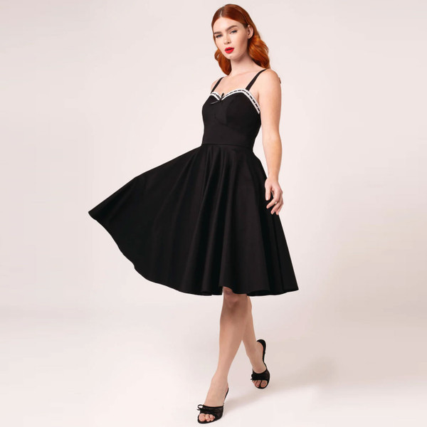 Woman wearing Hell Buunny Gracie Retro 50s Flared Midi Dress in Black