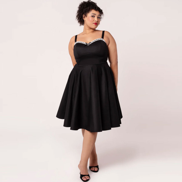 Woman wearing Hell Buunny Gracie Retro 50s Flared Midi Dress in Black