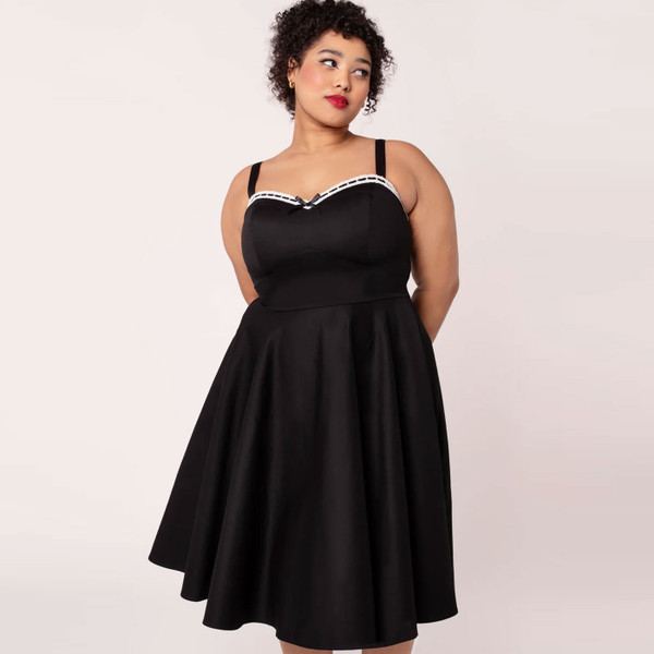 Woman wearing Hell Buunny Gracie Retro 50s Flared Midi Dress in Black