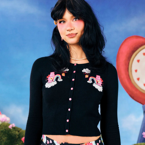 Woman wearing Hell Bunny x Care Bears Love A Lot Cardigan in Black