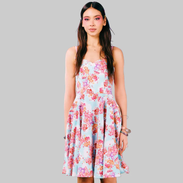 Model wearing Hell Bunny x Care Bears Picnic Bear Knee Length Summer Dress
