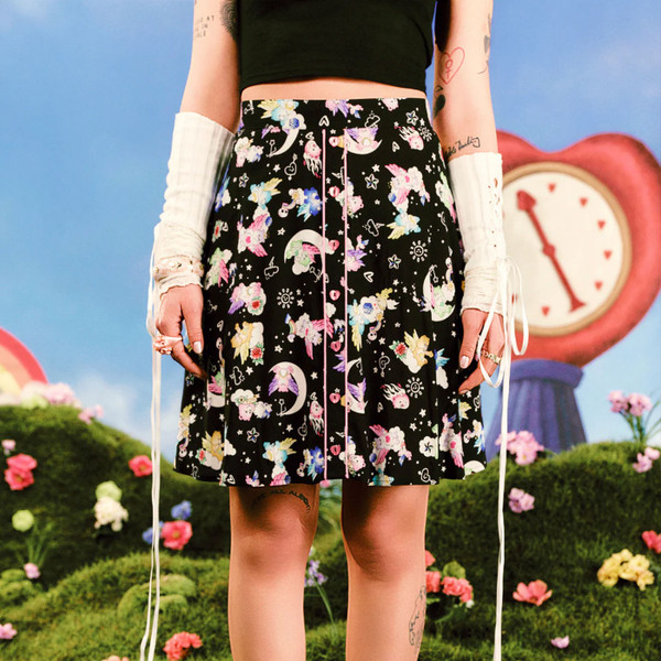Woman wearing Hell Bunny x Care Bears Roxi 80s Skirt in Black