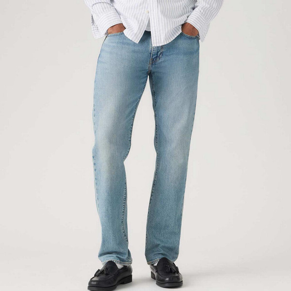 Model Wearing Levi's 502 Taper Men's Retro Denim Jeans in Just Say Hi Blue