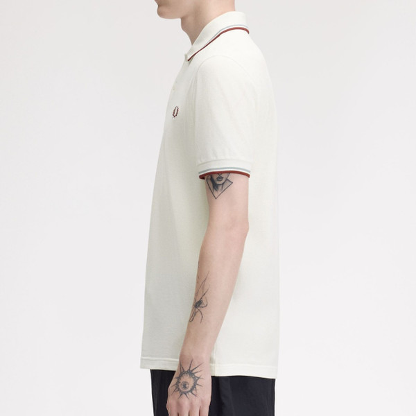 Model Wearing Fred Perry M3600 Mod Twin Tipped Polo Shirt in Snow White/Silver Blue/Brandy - Side View