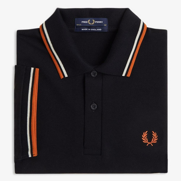 Fred Perry M12 Twin Tipped Polo Shirt in Black, Tramline White and Summer Clay - Folded Image