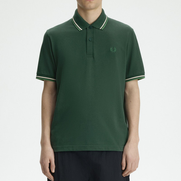 Model Wearing Fred Perry M12 Twin Tipped Polo Shirt in Grassroots, Tramline White and Ace Green - Front Facing