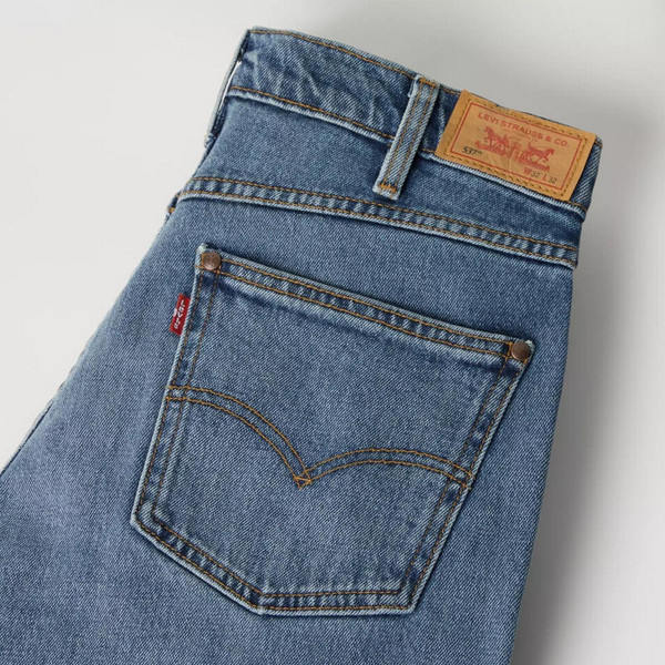Levi's Men's 537 Western Bootcut Medium Wash Blue Denim Jeans in Throw The Lasso - Folded 