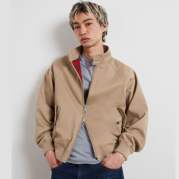 Model Wearing Farah Walt Cotton Twill Harrington Jacket in Beige - Front Facing Partially Unzipped