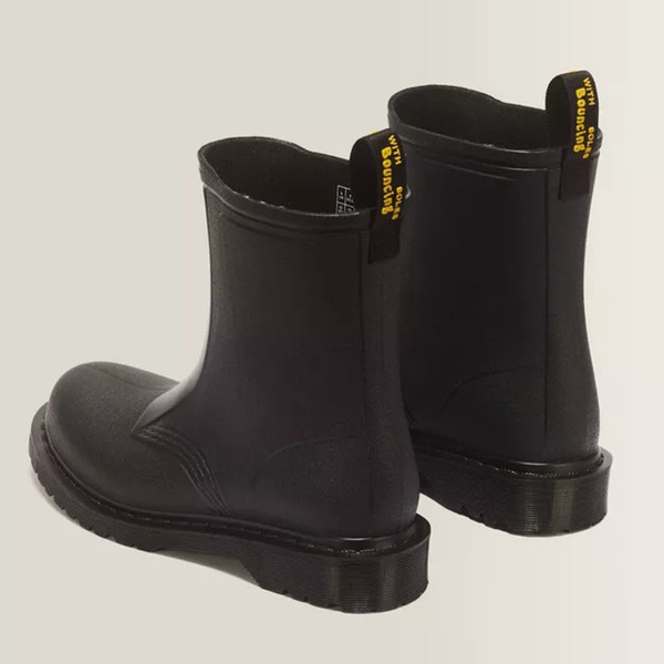 Dr Martens 1460 Rain PVC Welly Boot in Black - 2 boots back facing at angle