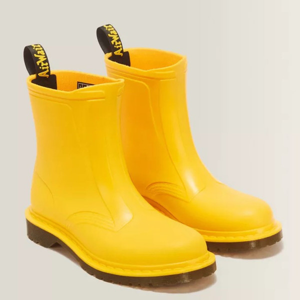 Dr Martens 1460 Rain PVC Welly Boot in Yellow - 2 boots front facing at angle