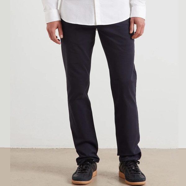 Model Wearing Farah Elm Slim Fit Organic Cotton Stretch Twill Chino Trousers in True Navy - Front Lower Half