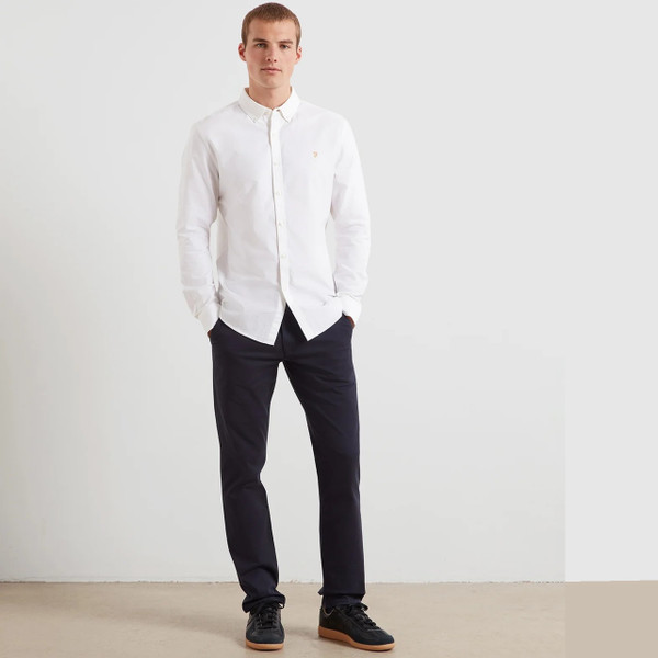 Model Wearing Farah Elm Slim Fit Organic Cotton Stretch Twill Chino Trousers in True Navy - Full Length Front