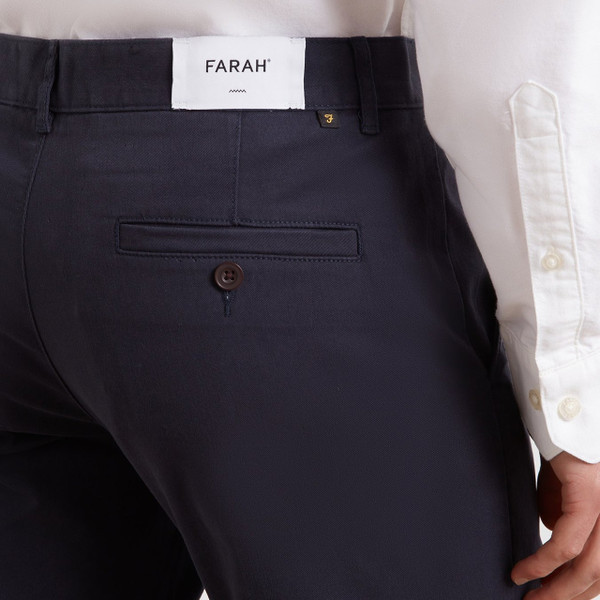 Model Wearing Farah Elm Slim Fit Organic Cotton Stretch Twill Chino Trousers in True Navy - Back Pocket Close-Up