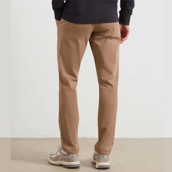 Model Wearing Farah Elm Slim Fit Organic Cotton Stretch Twill Chino Trousers in Beige - Back Lower Half