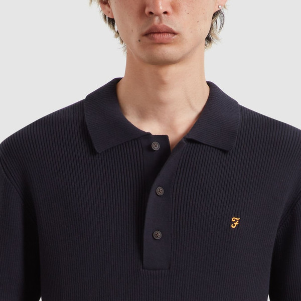 Model Wearing Farah Gerry Men's Rib Knit Polo Shirt in True Navy - Front Facing Close Up