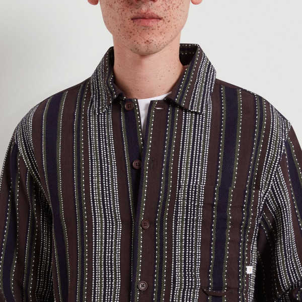 Model Wearing Farah Cody F-Tab Men's Stripe Long Sleeve Overshirt in Dark Brown - Front Facing Close Up