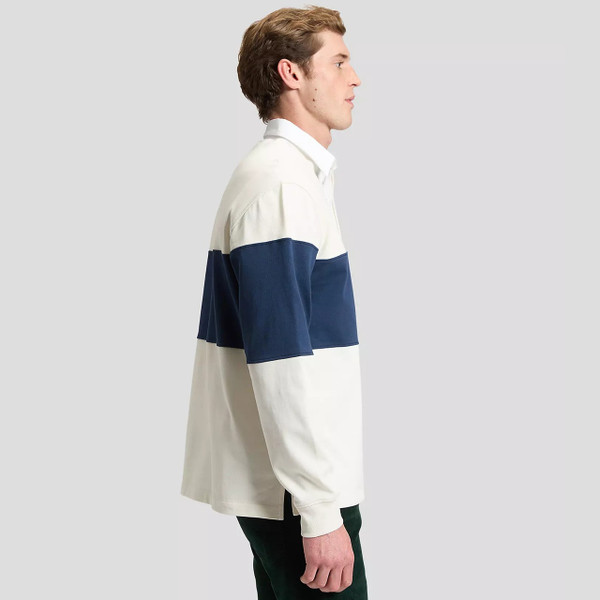 Model Wearing Lee Jeans Men's Relaxed Long Sleeve Rugby Tee in Ecru - Side View