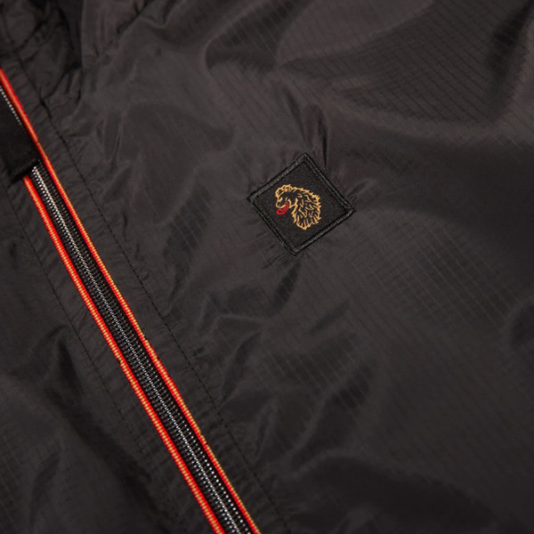 Luke 1977 Garnedd Men's Lightweight Hooded Nylon Jacket in Black - lions head motif close up
