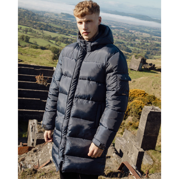 Man wearing Luke 1977 Inuit Men's Long Hooded Puffer Jacket in Porpoise Blue