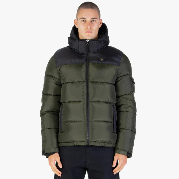 Model Wearing Luke 1977 Yupick Retro 80s Hooded Puffer Jacket in Dark Green - Front Facing