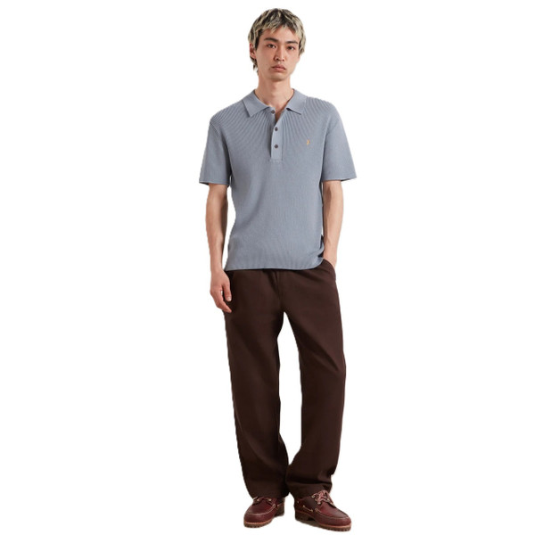 Model Wearing Farah Gerry Men's Retro Rib Knit Polo Shirt in Icelandic Blue - Front Facing Full Length