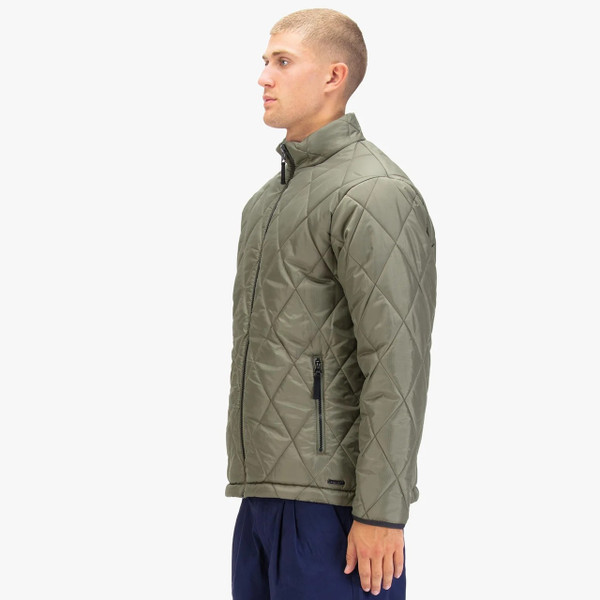 Model Wearing Luke 1977 Diamond Quilt Bubble Jacket in Clover - Side facing
