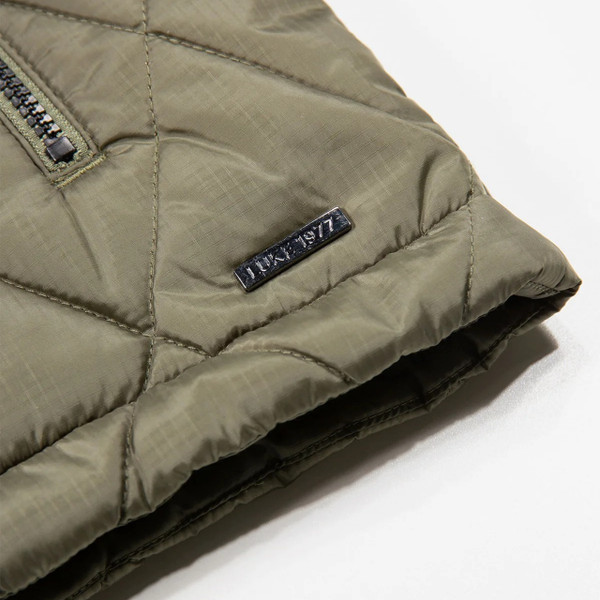 Luke 1977 Diamond Quilt Bubble Jacket in Clover - Close up branding