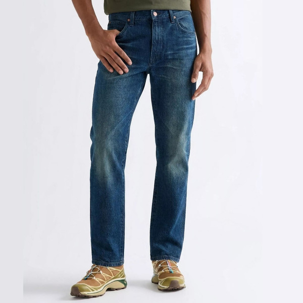Model Wearing Wrangler Men's 13MWZ Original Cowboy Cut Jeans in Work Wear Fade - Front facing