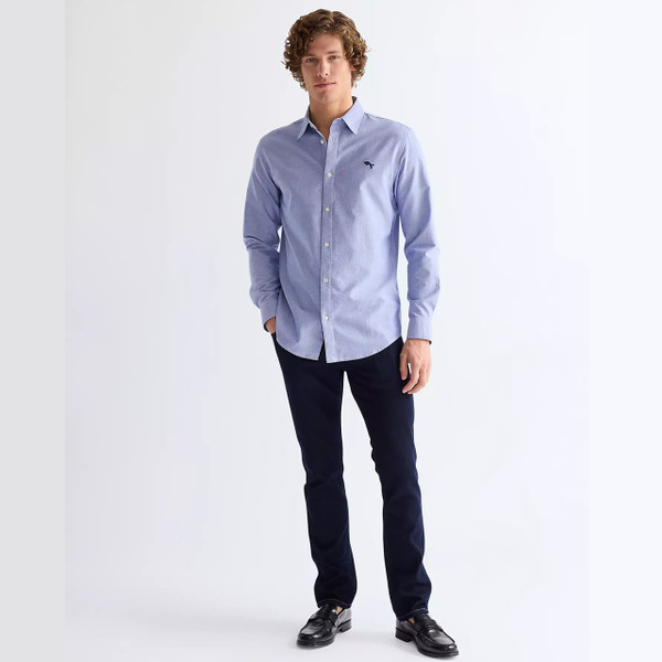 Model Wearing Wrangler Men's Greensboro Straight Fit Epic Soft Jeans in Moonlight Rinse - Front facing full length